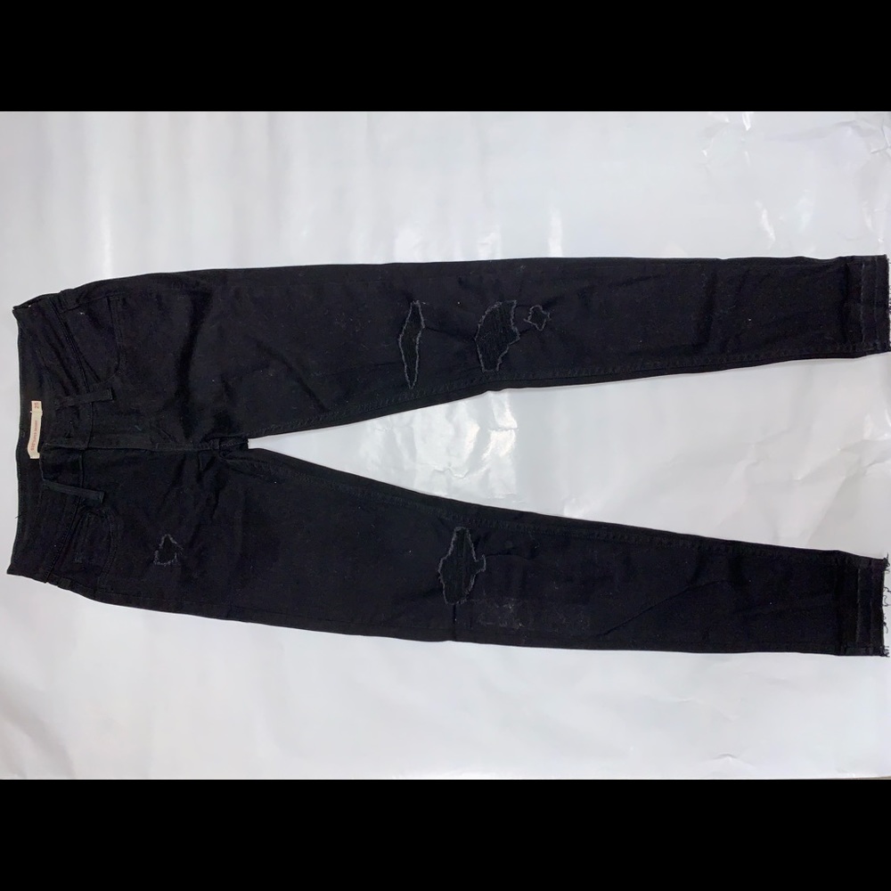 Ripped Levi’s Black Jeans
